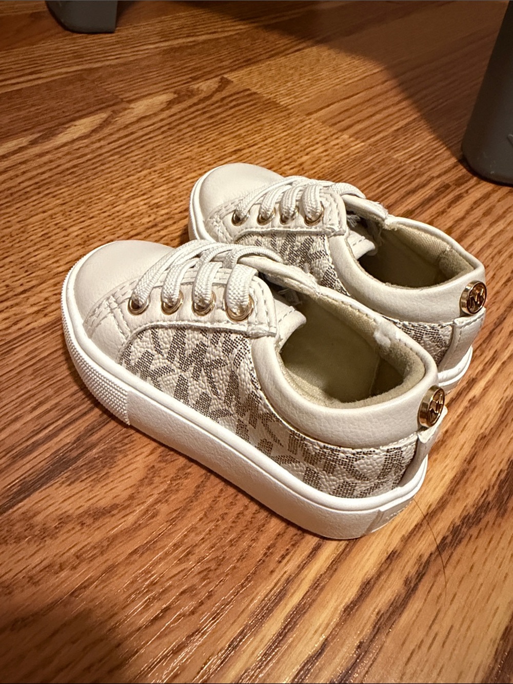 Michael Kors Cream Logo-Print Kids Sneakers with Gold Accents
